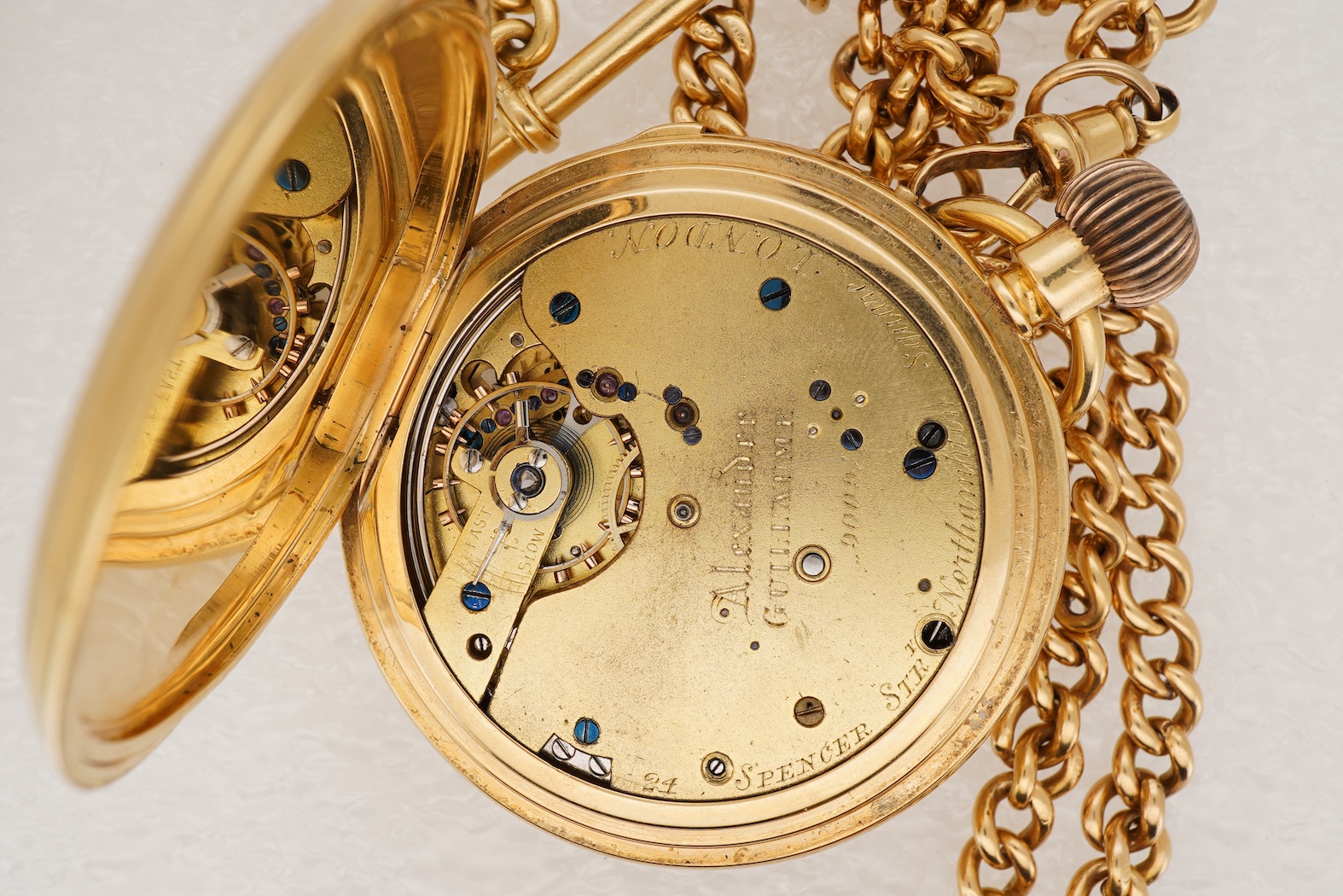 A late Victorian 18ct gold half hunter quarter repeating keyless lever pocket watch, by Alexander Guillaume, Spencer St, Northampton Sq. London, together with a similar 18ct gold curb link albert, hung with a yellow meta